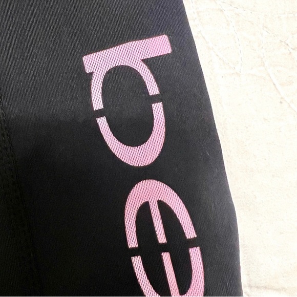 NWT BEBE SPORT LASER CUT LOGO BLACK CAPRI LEGGINGS - Picture 8 of 10